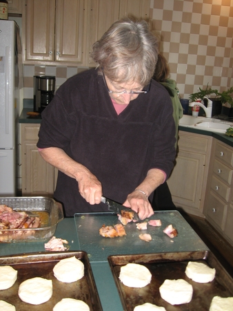 Ginny making ham and biscuits